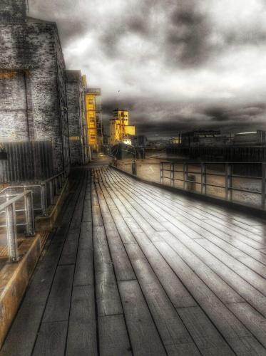 a view of a wooden deck on a building at Sky Marina Suite Penthouse in Hull