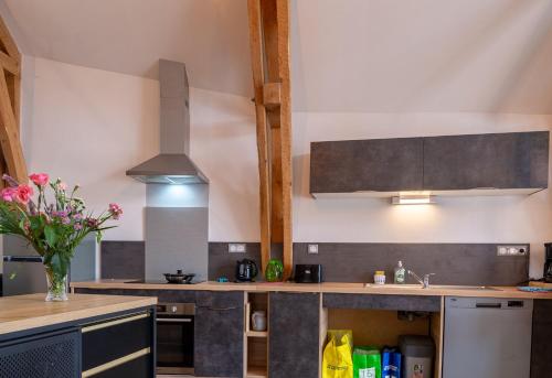 Kuchyň nebo kuchyňský kout v ubytování Gîte Gîte La Bergerie 5/6 personnes