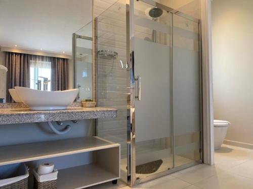 Ванная комната в George Luxury Rooms