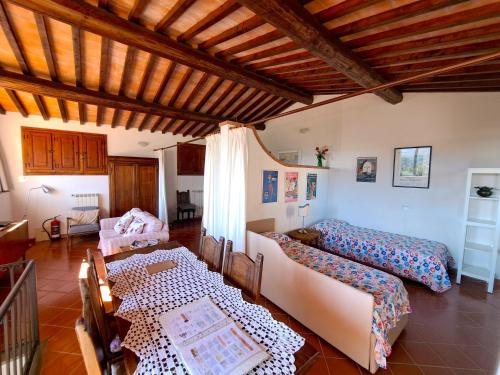 Giường trong phòng chung tại La Favilletta Casa Vacanze