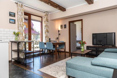 A seating area at udanypobyt Apartamenty Przy Dolinach C i D