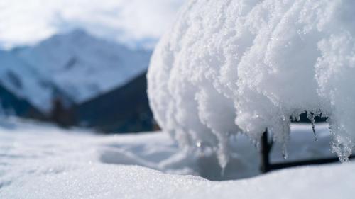 a pile of snow on the side of a car at Agriturismo Plan de la Tour B&B in Cogne