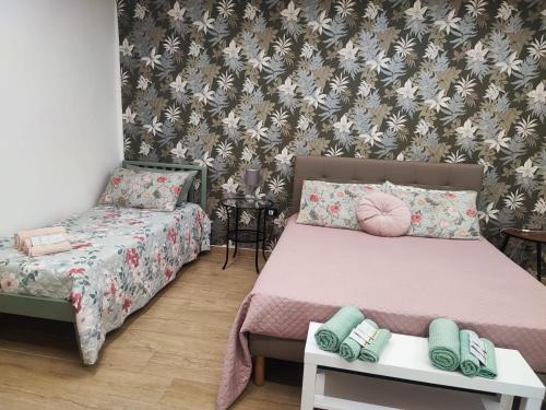 Letto o letti in una camera di DN Holiday House