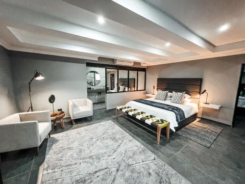 Ένα ή περισσότερα κρεβάτια σε δωμάτιο στο 4 Aces Outfitters Lodge