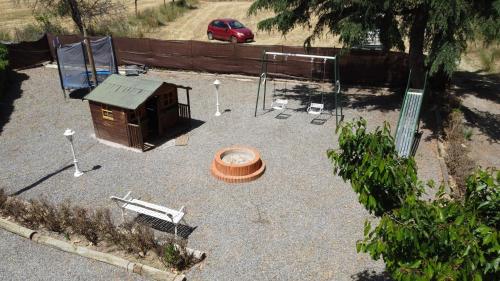 an aerial view of a park with a playground at Villa Fuente Victoria in Fuente Victoria