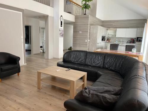 Posezení v ubytování Loft apartment für bis zu 4 Personen