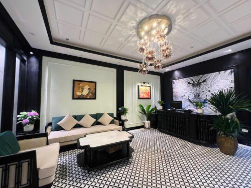 Χώρος καθιστικού στο GRAND HOTEL Trịnh Văn Bô