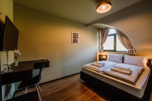 Katil atau katil-katil dalam bilik di Motel Oasis