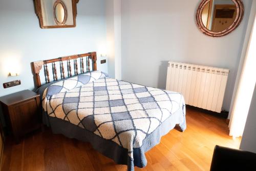 Postel nebo postele na pokoji v ubytování Hotel Rural Astura