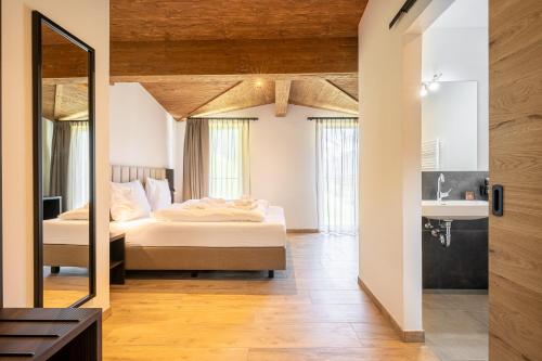 Alpenzauber Apartments by Montevivaにあるベッド