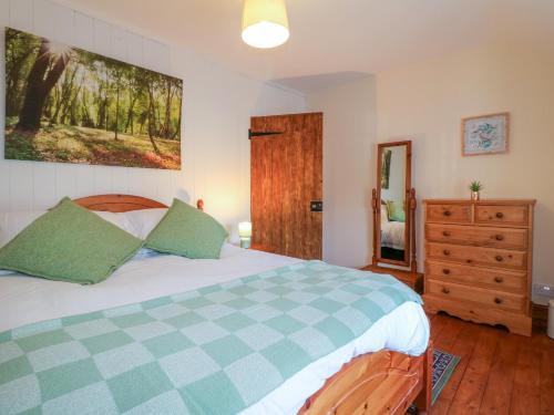 Voodi või voodid majutusasutuse Rock Cottage toas