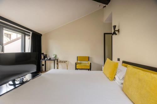 Katil atau katil-katil dalam bilik di Roma Luxus Hotel