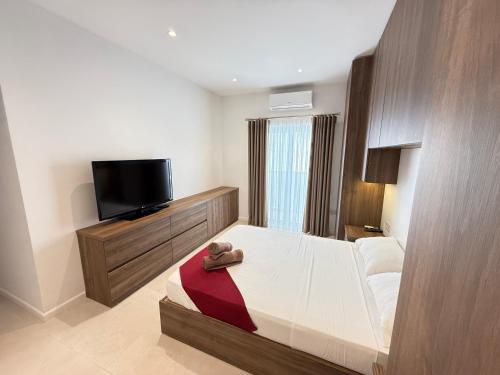 Postel nebo postele na pokoji v ubytování Redentur apartments, suite 1