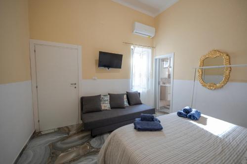 Postel nebo postele na pokoji v ubytování Il faro 17