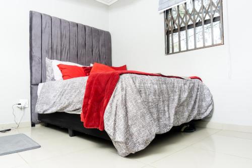 Ένα ή περισσότερα κρεβάτια σε δωμάτιο στο homeaway at 66