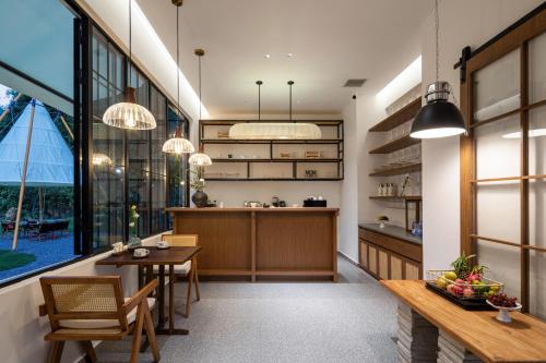 Kuchyň nebo kuchyňský kout v ubytování Dyed Mount Boutique Hotel