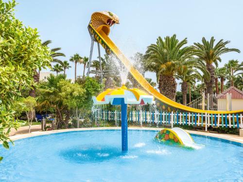 a water slide in a pool at a resort at TUI BLUE Manar in Hammamet