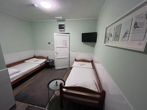 Postel nebo postele na pokoji v ubytování Flow House