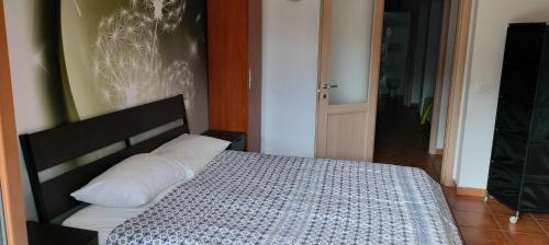 Una cama o camas en una habitación de Mimì Home