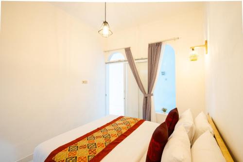 Mahayana Guest Houseにあるベッド