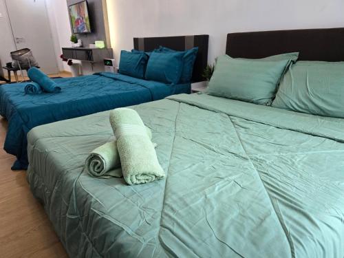 Ένα ή περισσότερα κρεβάτια σε δωμάτιο στο Khaimal Valley Suite - Pool View