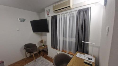 Μια τηλεόραση ή/και κέντρο ψυχαγωγίας στο Olimpus Apartmani BD Banjaluka