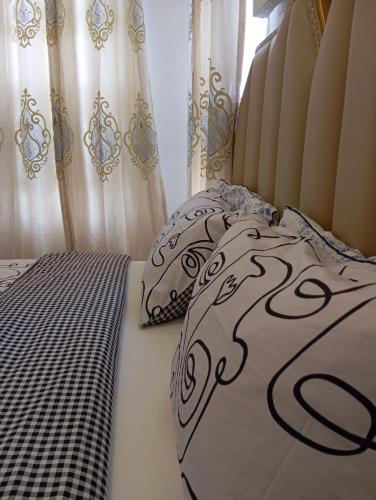Cama o camas de una habitación en Mon Nid d'Or ABIDJAN CI
