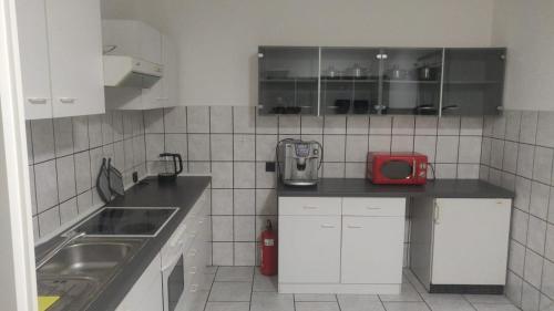 Una cocina o cocineta en BerlinDreams - F81
