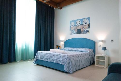 Una cama o camas en una habitación de Stellaris