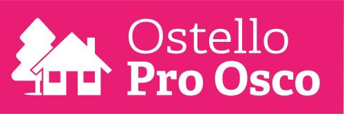 a pink sign with the words oelina procolo at Ostello Pro Osco in Faido
