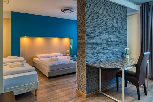 Кровать или кровати в номере City Budget Hotel