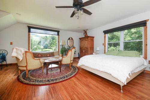 Katil atau katil-katil dalam bilik di Blue Rivers Cottage & Loft