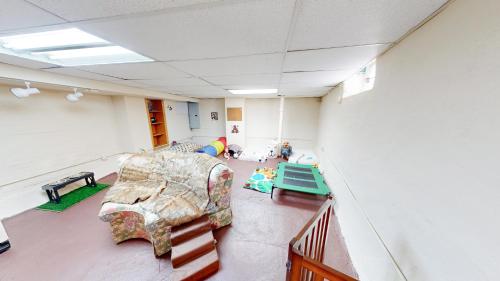 a waiting room with a couch and toys in it at ENTIRE Pittsburgh Home Close To Events - Kid Friendly - Designated Dog & Cat Areas - Private Patio - Free Parking - Fireplace in Pittsburgh
