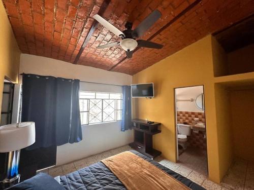 Ένα ή περισσότερα κρεβάτια σε δωμάτιο στο Apartamento de Flores