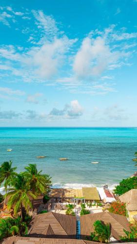a view of the ocean from a resort at B4 BOUTIQUE in Paje