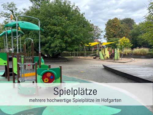 a playground in a park with a slide at Casa Michaela Öhringen - wunderschöne Aussicht - Top für Familien und Geschäftsreisen, super ausgestattet in Öhringen