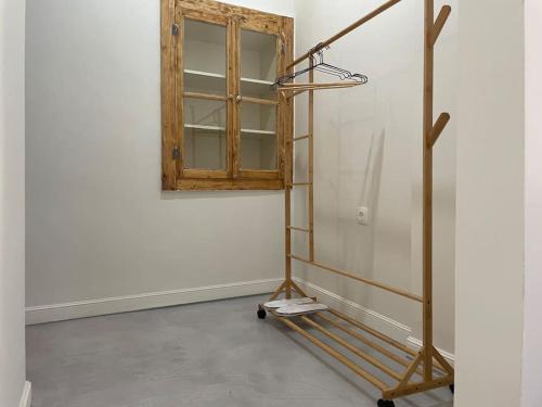 a shelf in a room with a window at Sphinx Apartments - A in Chios