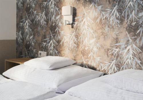 Postel nebo postele na pokoji v ubytování Apartmány Benedicta