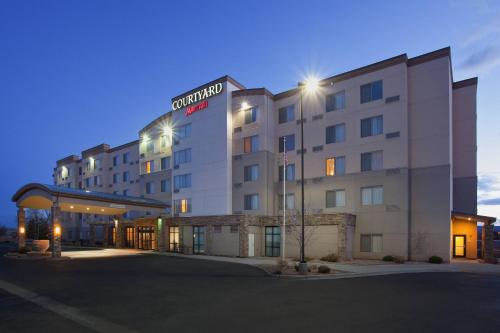 a rendering of a hotel at night at Courtyard Grand Junction in Grand Junction