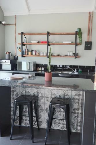 Cuisine ou kitchenette dans l'établissement Febe-Mari Guesthouse