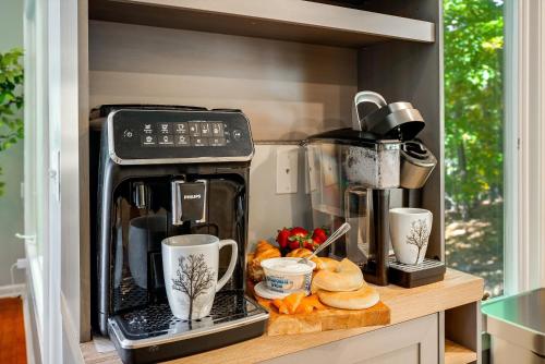 a coffee maker on a counter in a kitchen at Mt Views - Sauna - Hot Tub - Adulting - Family Fun in Massanutten