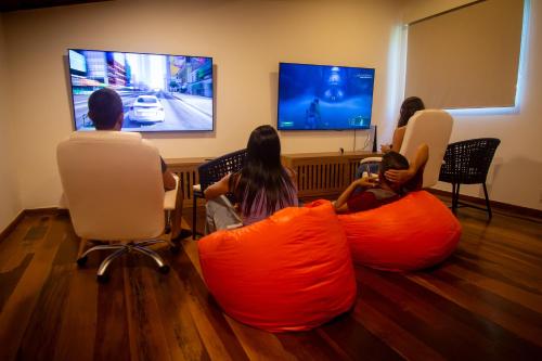 TV a/nebo společenská místnost v ubytování Hotel Experience João Fernandes