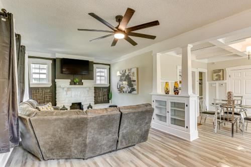 a living room with a couch and a ceiling fan at 3 Mi to Dtwn Memphis Family Home in Memphis
