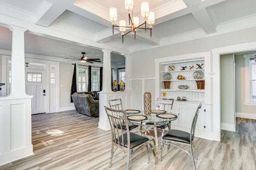 a dining room and kitchen with a table and chairs at 3 Mi to Dtwn Memphis Family Home in Memphis