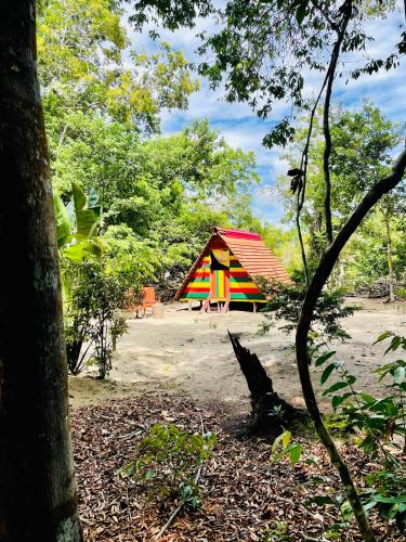 a colorful building in the middle of a park at Land of Promise - Reggae Escape in Zanderij