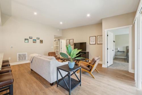 a living room with a couch and a table at A pet friendly cozy condo in Traverse City in Traverse City