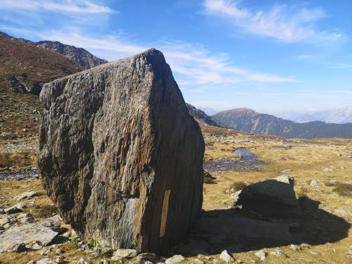 a large rock on the side of a mountain at Ferienwohnung Tanzer in Ellbögen