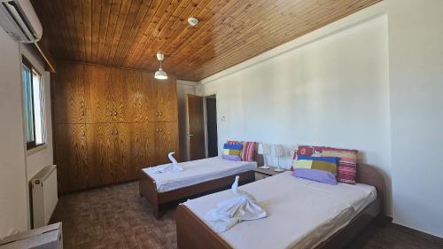 Ένα ή περισσότερα κρεβάτια σε δωμάτιο στο STAY Uptown Apartment