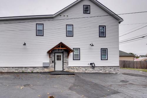 a large white house with a white door at Walk to Lititz Springs Park Cozy Getaway! in Lititz