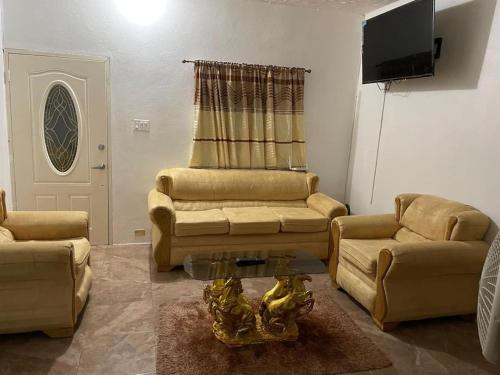 Posezení v ubytování Shadricks Homes